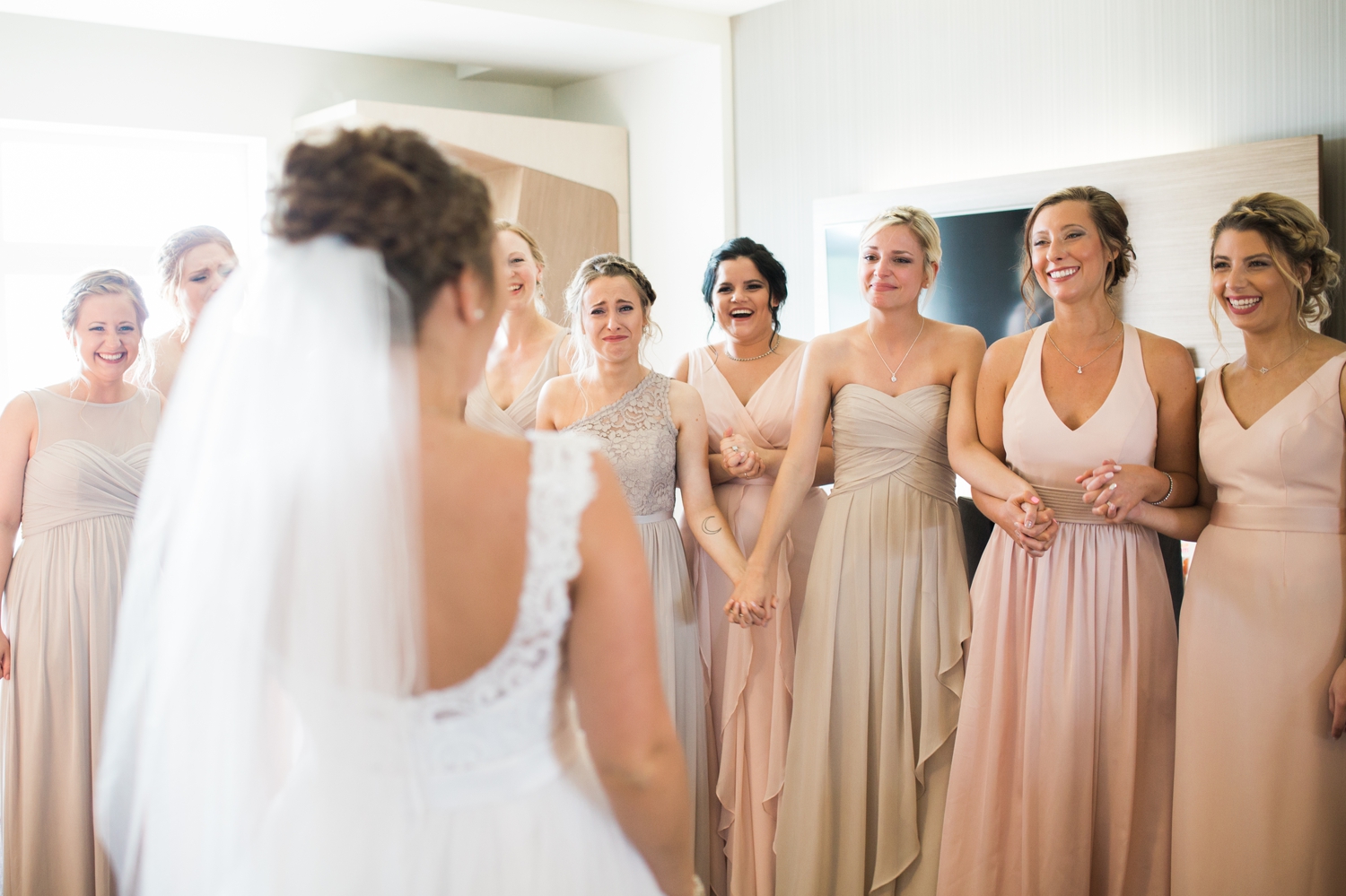 Erin wanted to do a "first look" with all of her girls. Their reaction was just the best. You can just tell her beauty just left them speechless or in tears! 